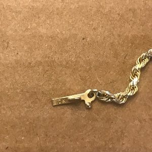 Gold rope type chain, with safety clasp. 10K gold. 20 inches long.